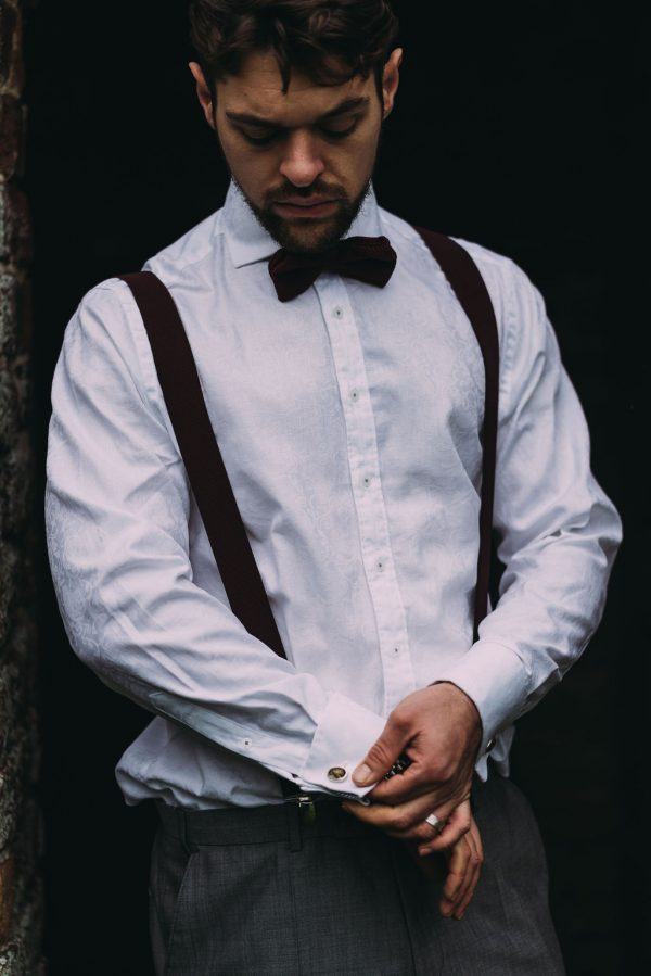 cufflinks on groom model