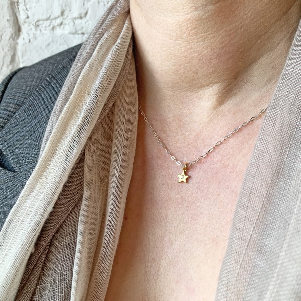 fairtrade-gold-white-sapphire-star-pendant-necklace-on-model